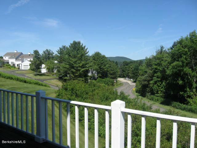 1136-9 Barker Road, Unit 9 Pittsfield, MA 01201 - Photo 45 of 45 a balcony with an outdoor space