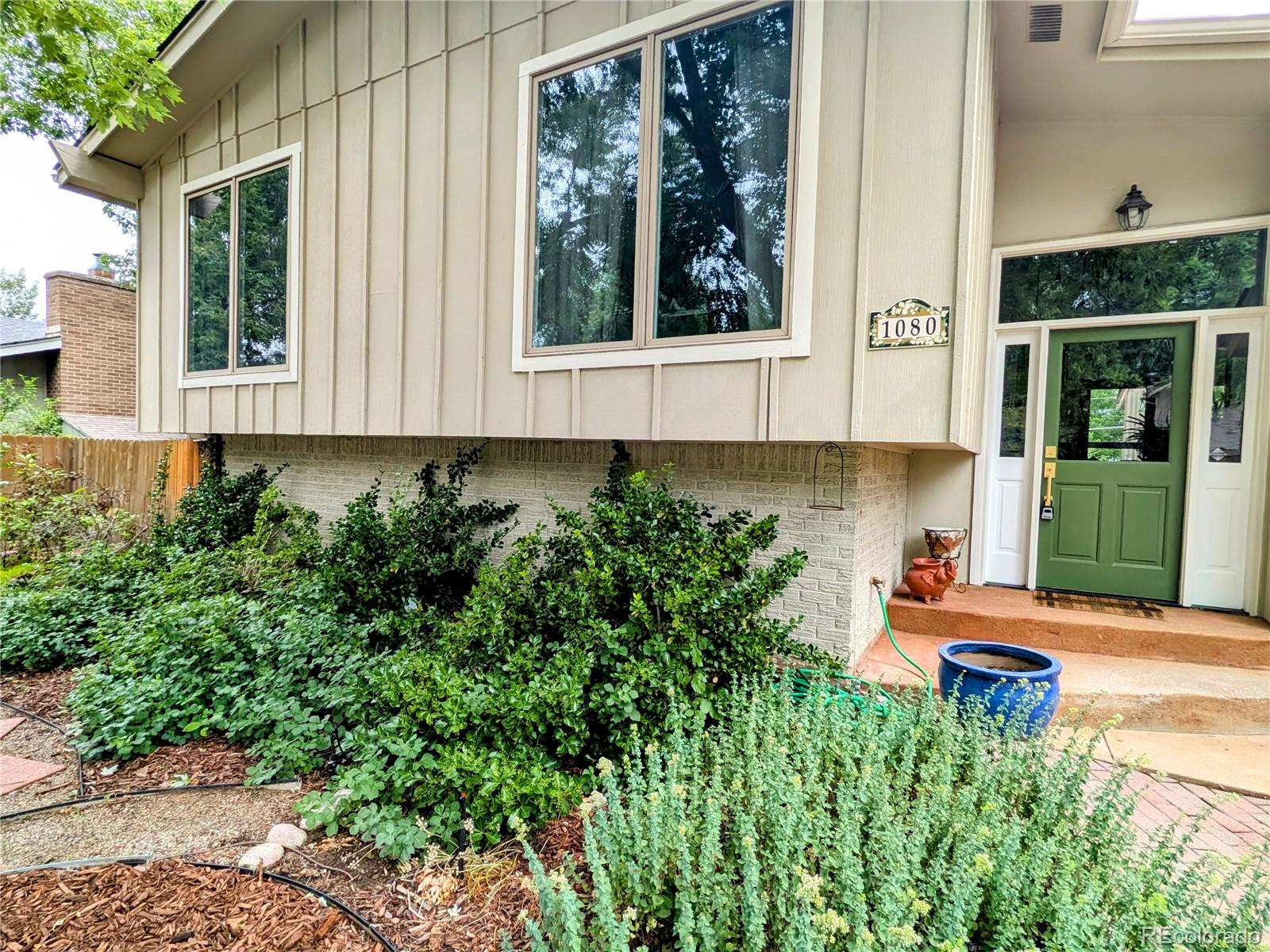 a backyard of a house with seating space