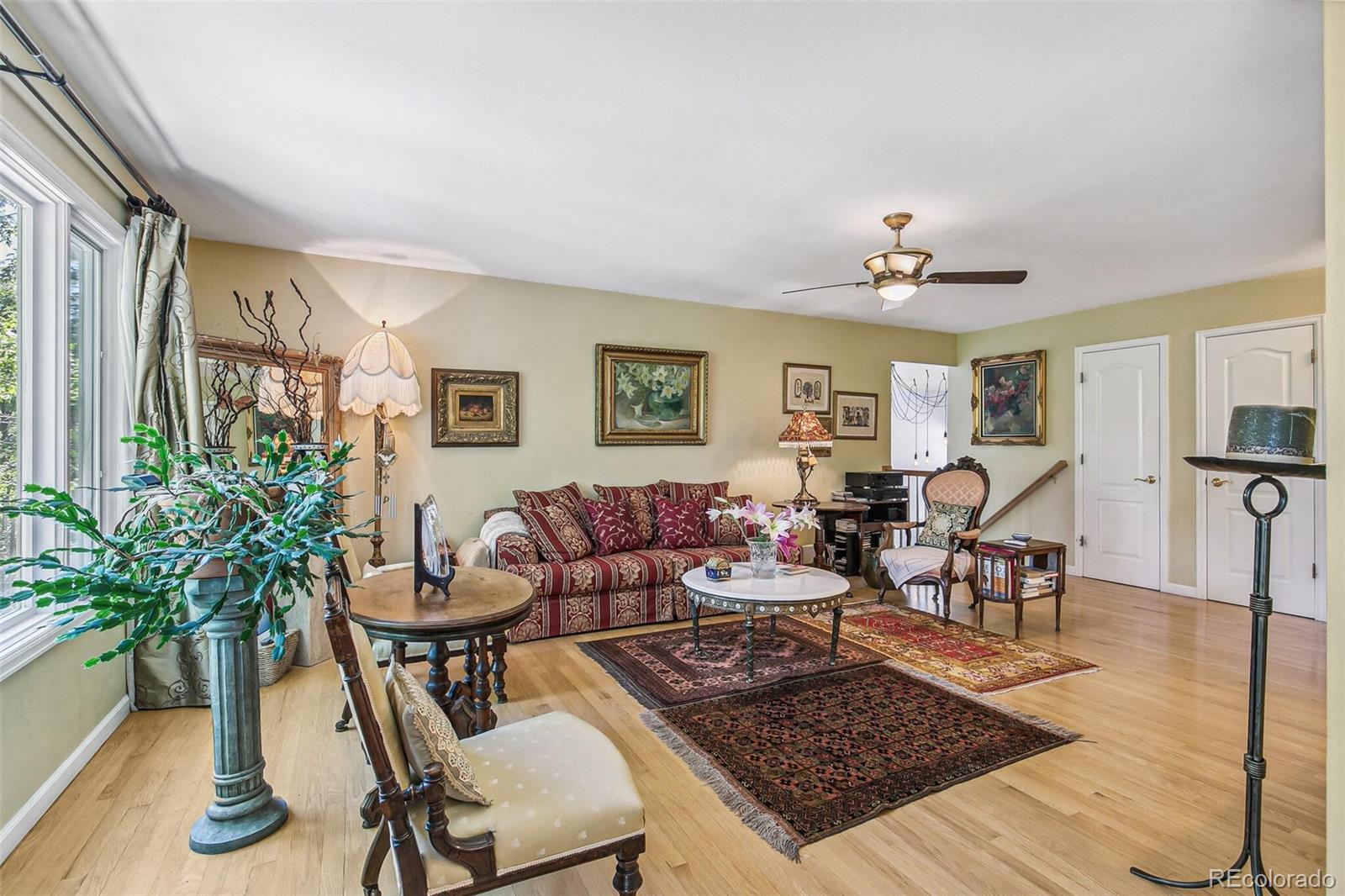 1080 Ithaca Drive Boulder, CO 80305 - Photo 18 of 35 a living room with furniture potted plant and a table