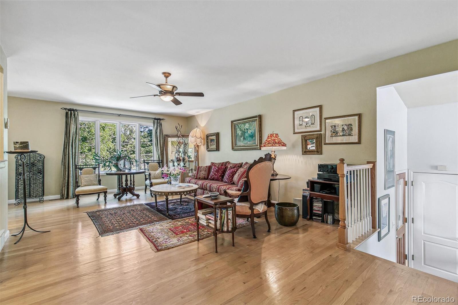 1080 Ithaca Drive Boulder, CO 80305 - Photo 19 of 35 a living room with furniture window and wooden floor