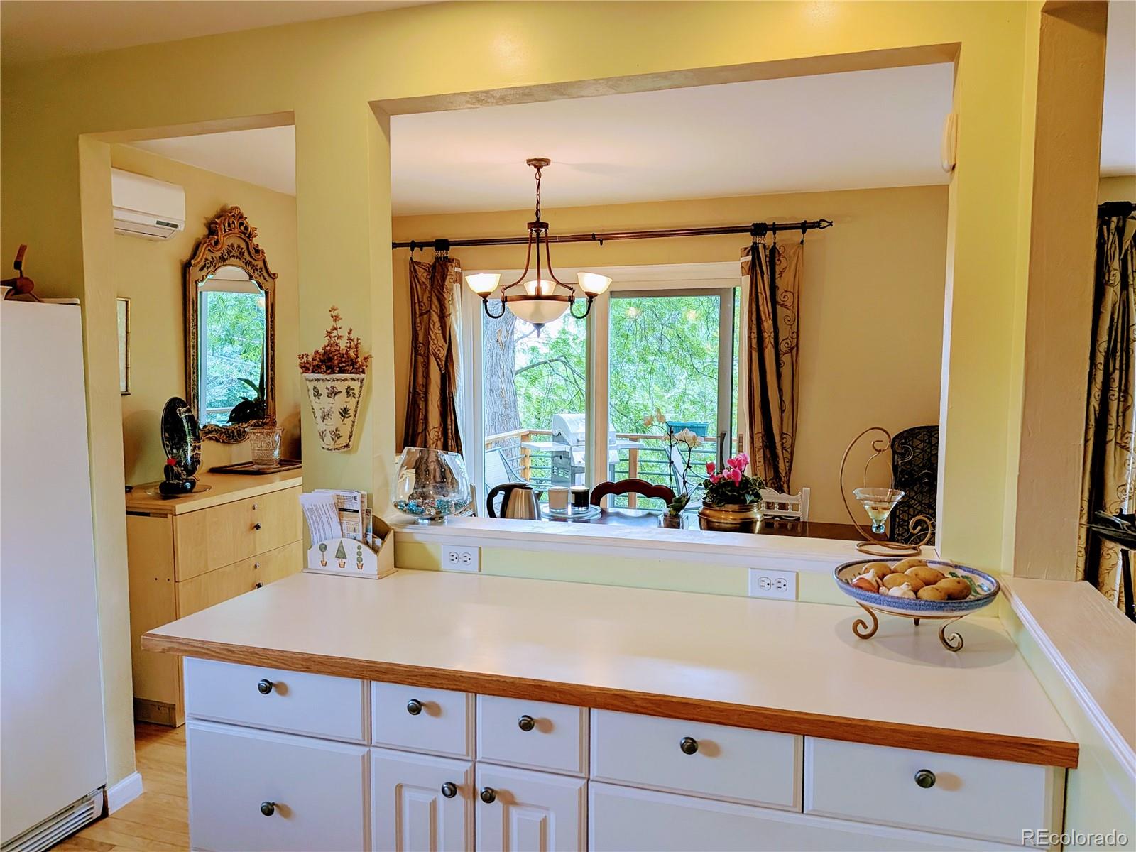 1080 Ithaca Drive Boulder, CO 80305 - Photo 22 of 35 a kitchen with a sink and a large window