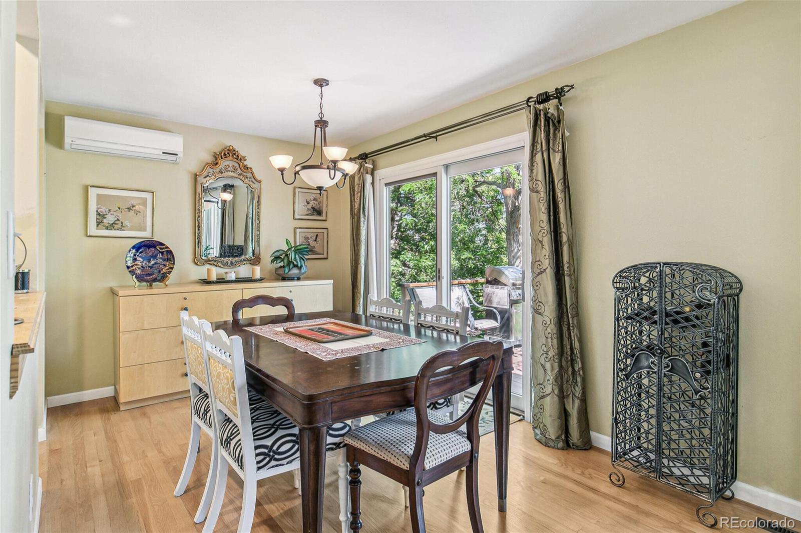 1080 Ithaca Drive Boulder, CO 80305 - Photo 23 of 35 a dining room with furniture window wooden floor