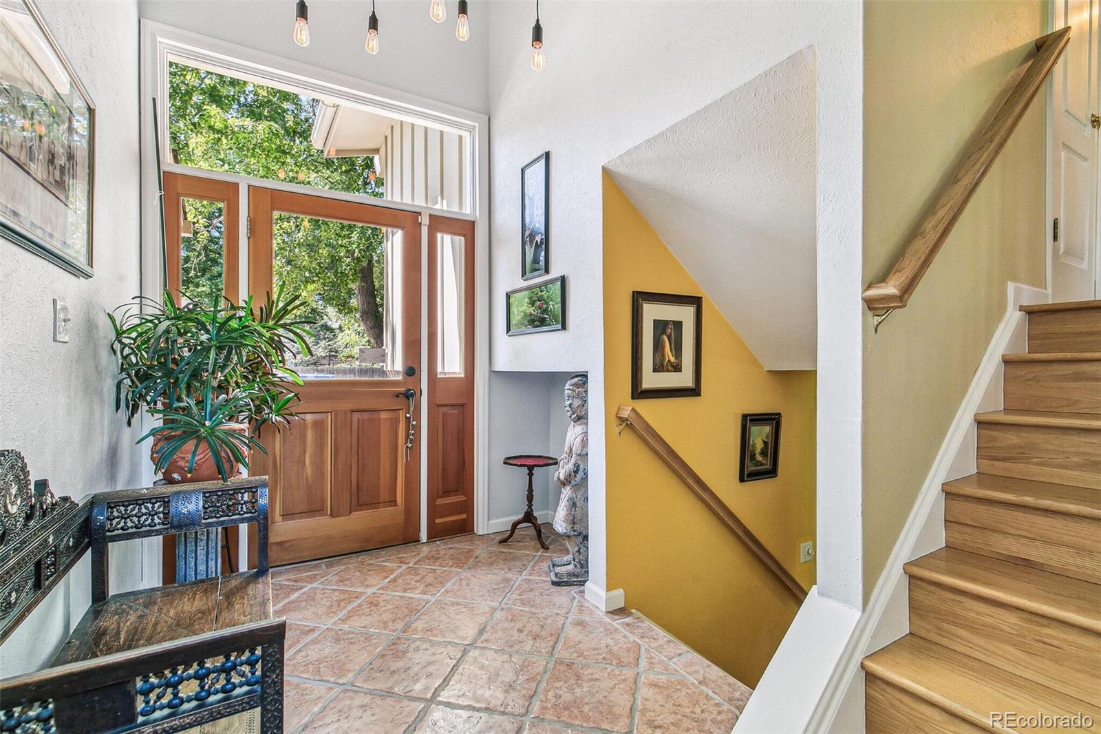 1080 Ithaca Drive Boulder, CO 80305 - Photo 6 of 35 a entryway with furniture and a potted plant