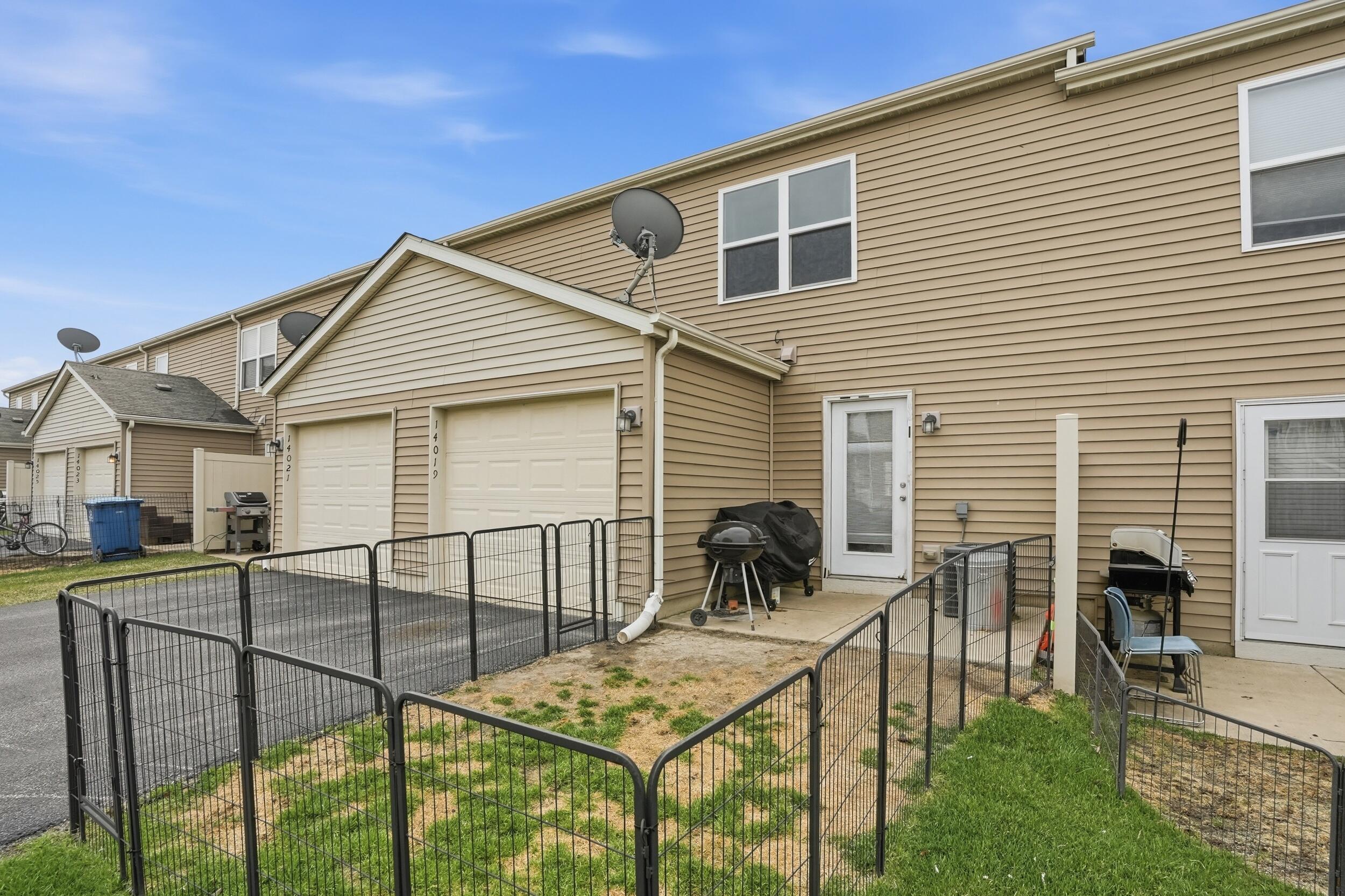 14019 Paramount Way Cedar Lake, IN 46303 - Photo 12 of 17 a view of a house with backyard and couches