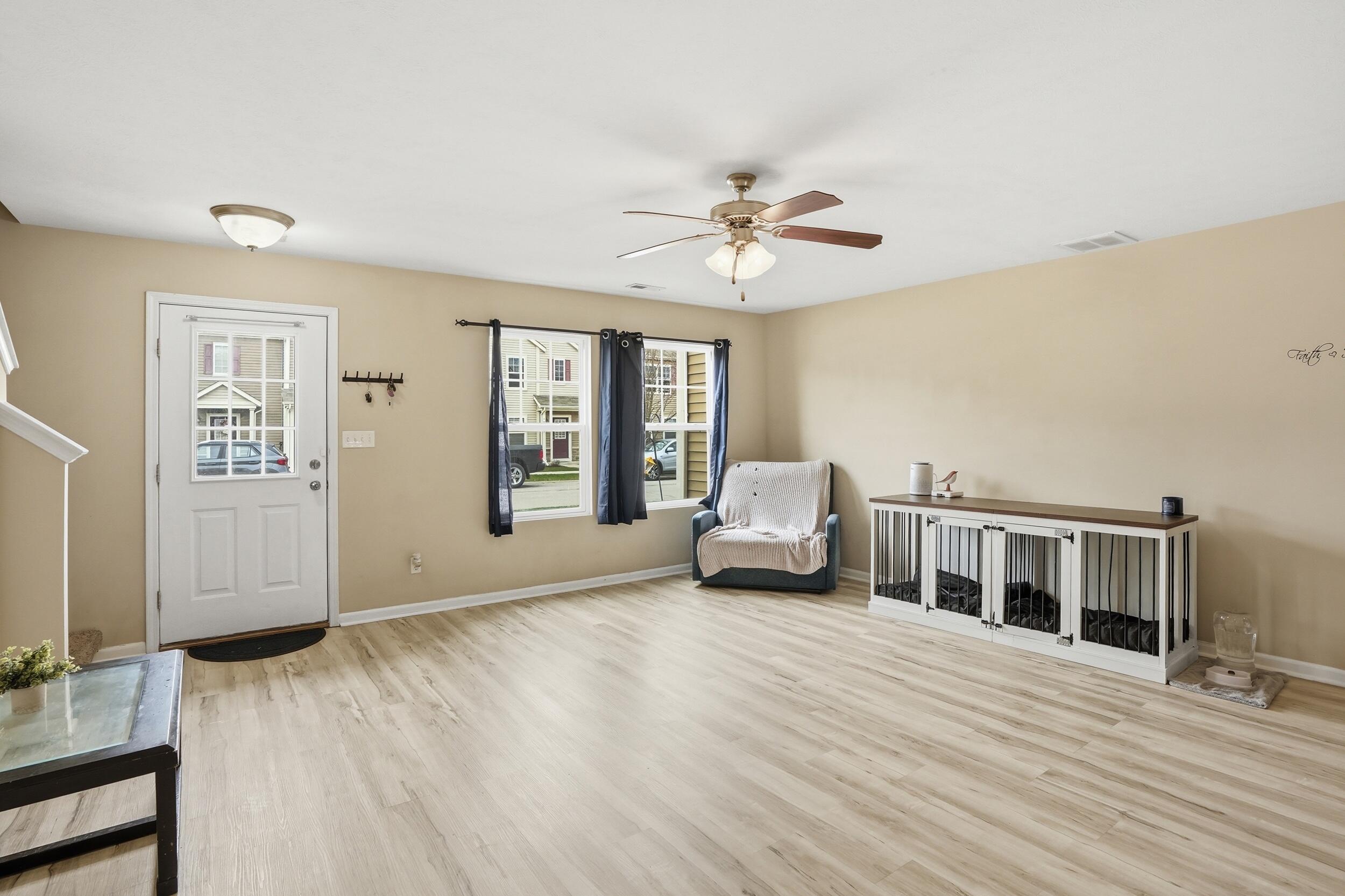 14019 Paramount Way Cedar Lake, IN 46303 - Photo 5 of 17 a living room with furniture and a flat screen tv