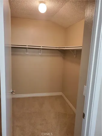 a view of small space with racks on the wall