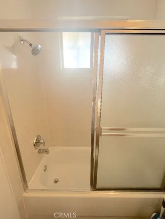 a view of a chairs and table in a patio