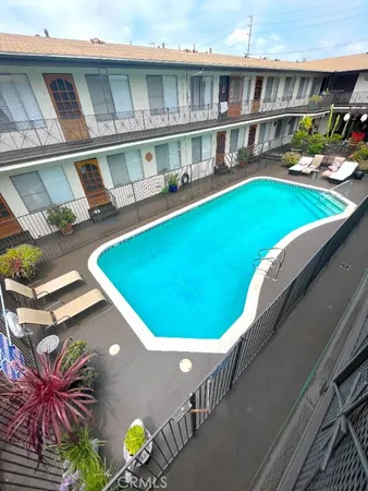 a terrace with a table and chairs