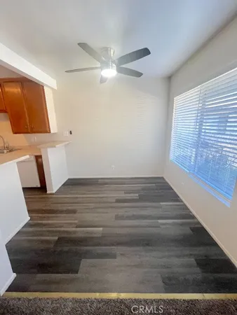 a stove top oven sitting inside of a kitchen