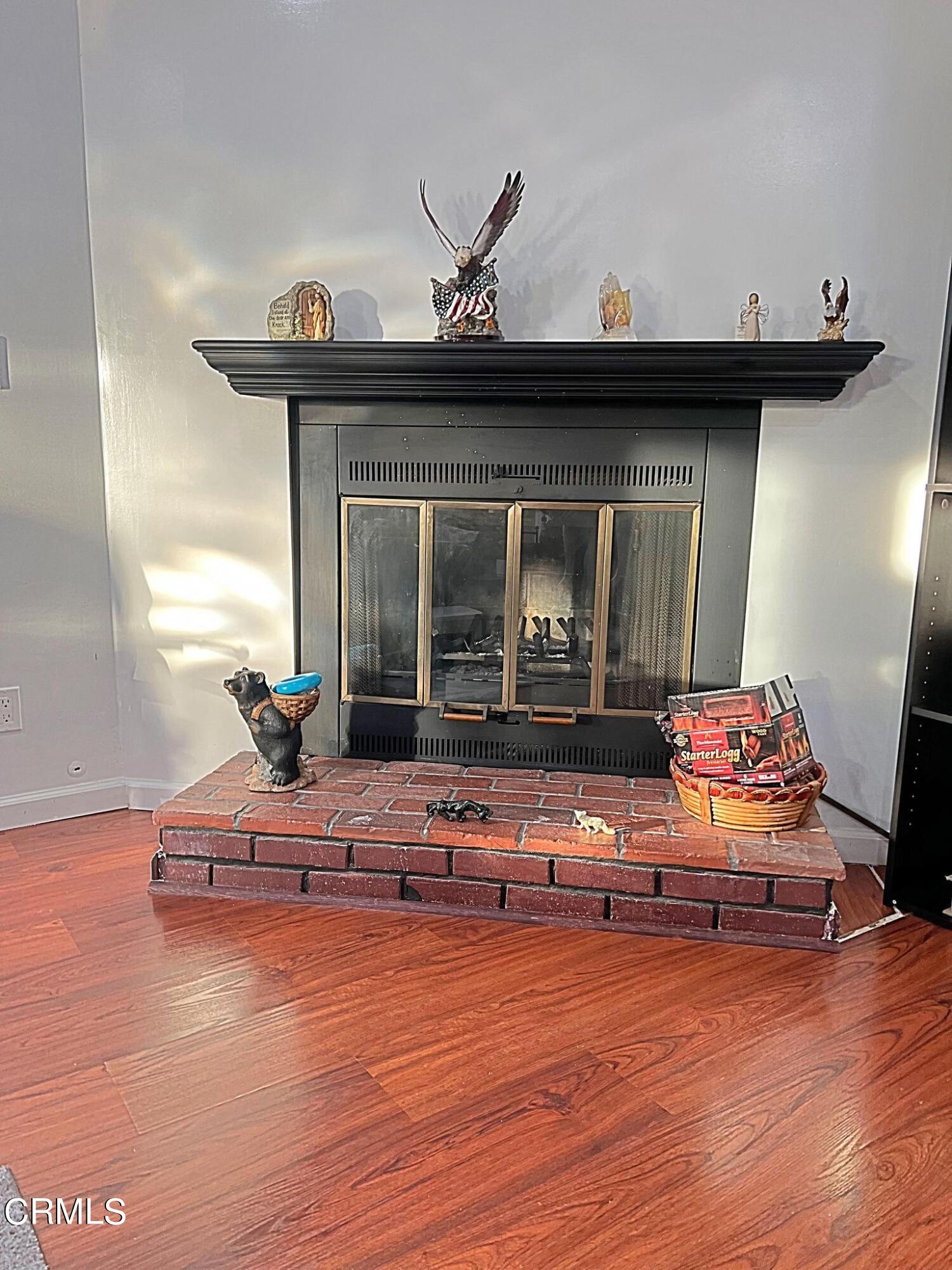 2510 Elderberry Drive, Unit 60 Oxnard, CA 93036 - Photo 11 of 37 a living room with furniture and a chandelier