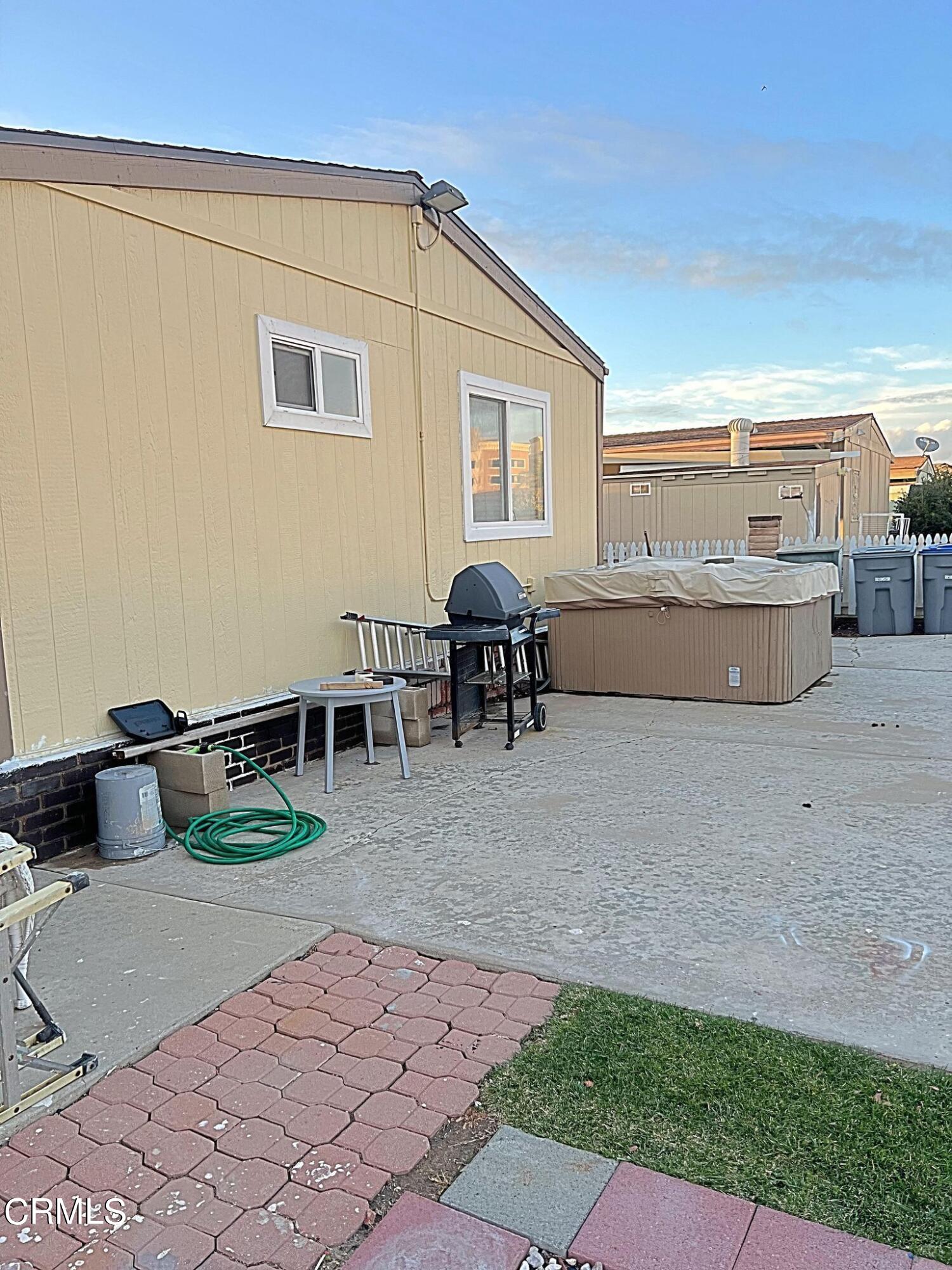 2510 Elderberry Drive, Unit 60 Oxnard, CA 93036 - Photo 34 of 37 a room with furniture and view of kitchen