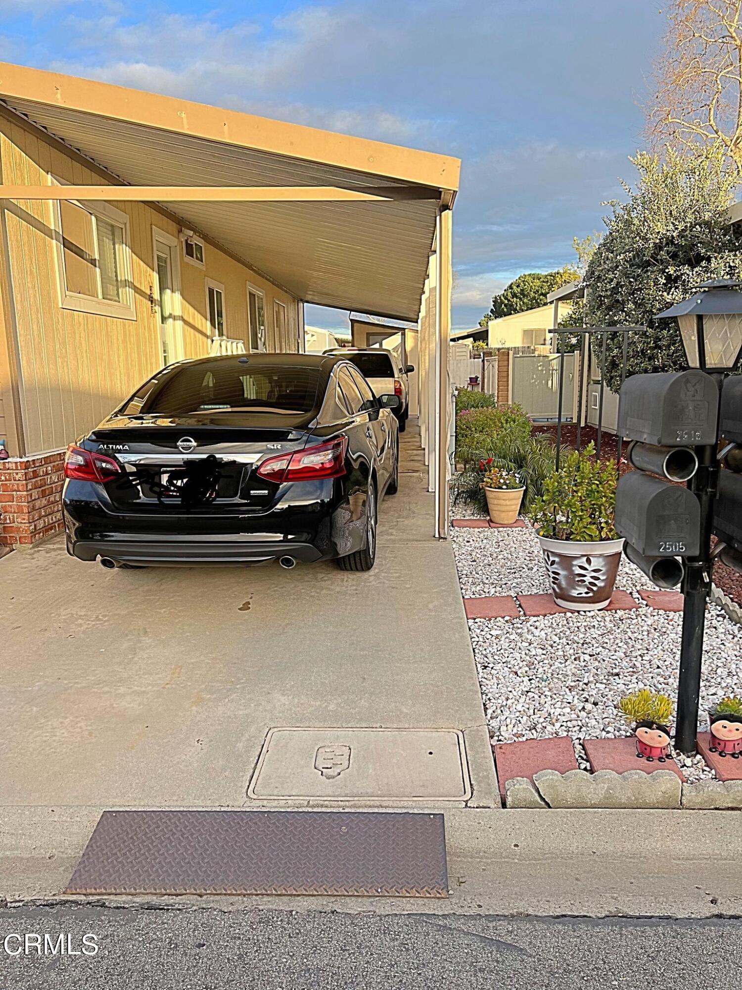 2510 Elderberry Drive, Unit 60 Oxnard, CA 93036 - Photo 4 of 37 a car parked in front of a building