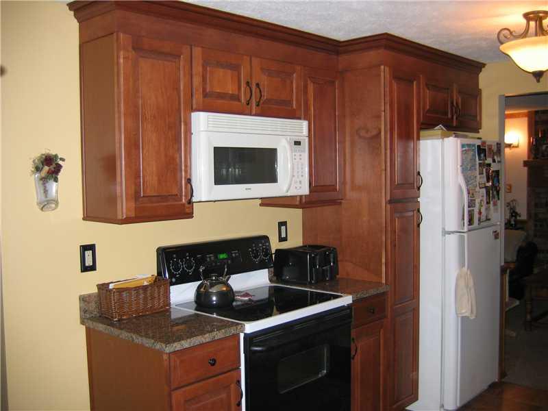 336 Partridge Run Road Gibsonia, PA 15044 - Photo 6 of 16 Kitchen. The kitcehn boasts extra cabinets for storage and a pantry.