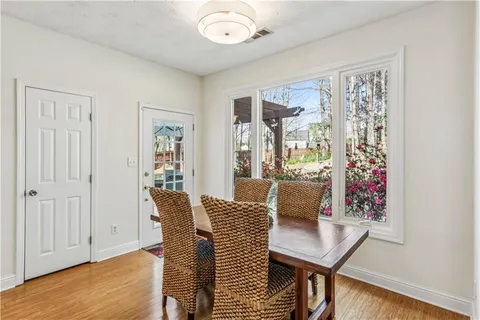 a kitchen with stainless steel appliances a stove sink and cabinets