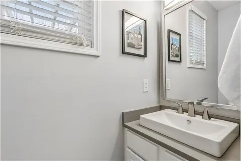 a view of a table and chairs under an umbrella