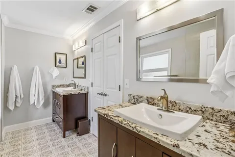 a bathroom with a bathtub and shower