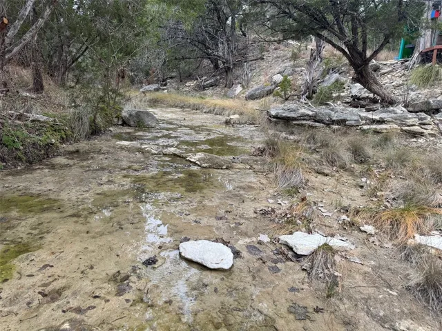 a view of a backyard of a house