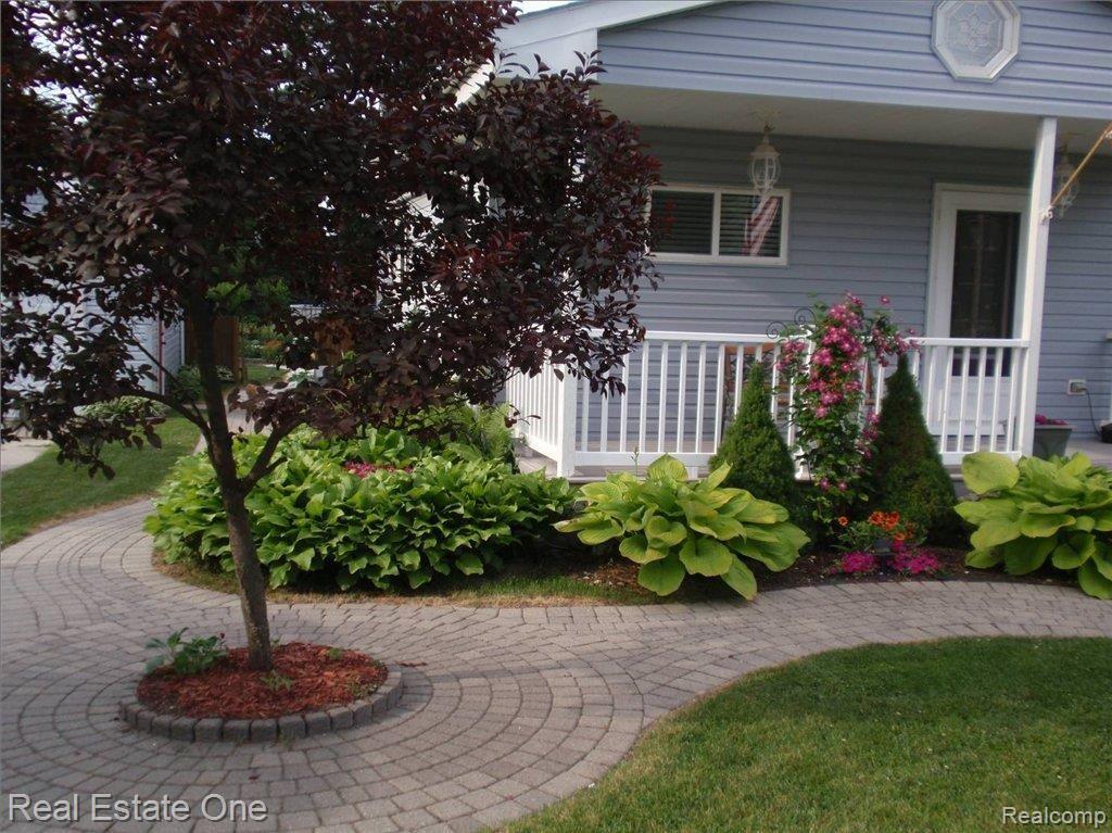 5576 Hearst Road Utica, MI 48317 - Photo 21 of 25 Brick paver, nicely landscaped
