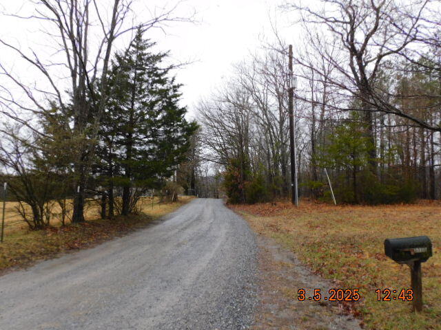 1168 Wilford Hollow Road Vinton, VA 24179 - Photo 2 of 4 a view of a yard with trees