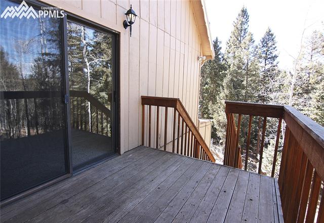 377 Ridge Road Divide, CO 80814 - Photo 14 of 35 Deck off of the master bedroom