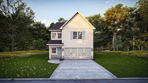 a view of house with a yard