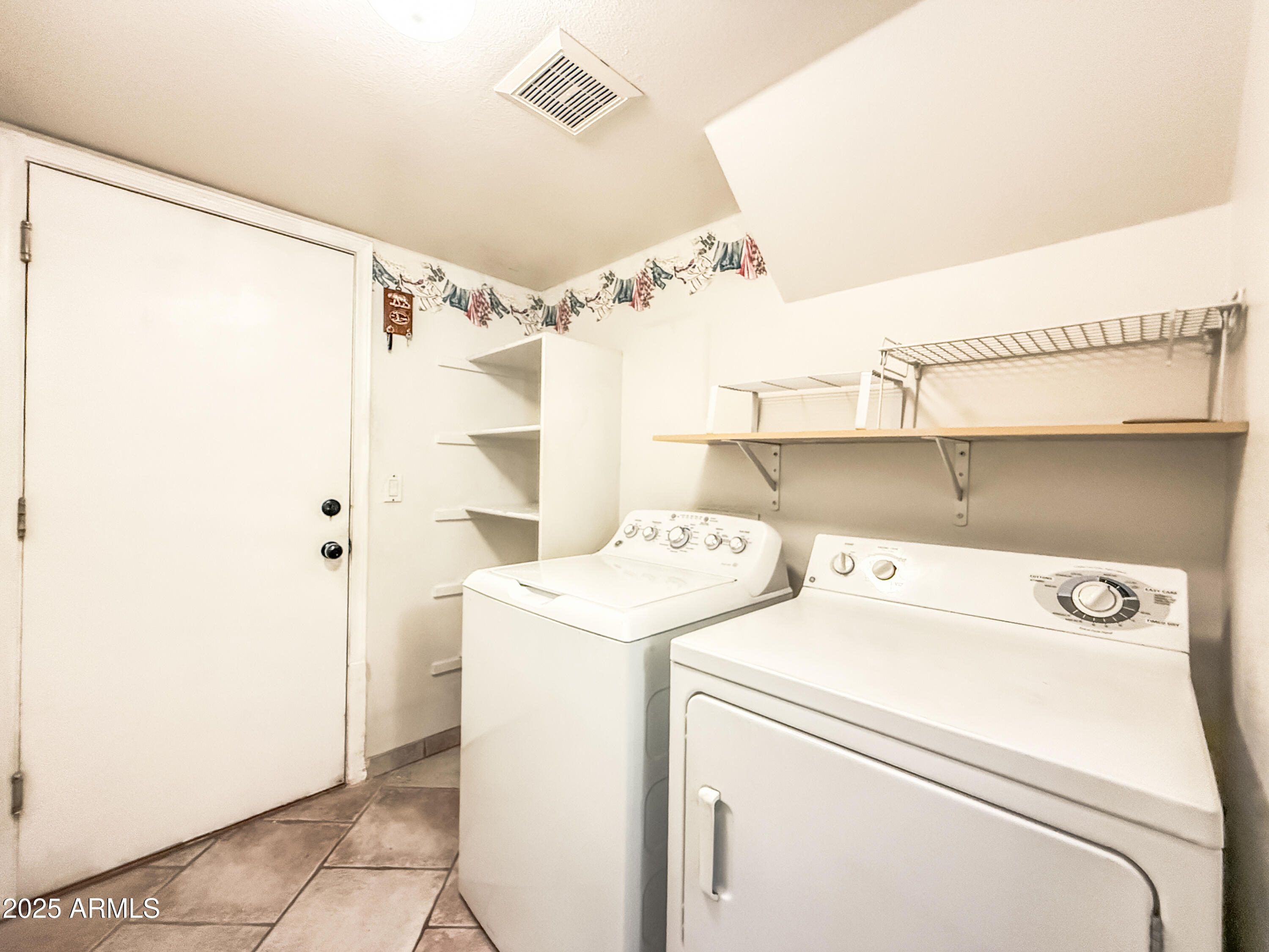 5057 East Delta Avenue Mesa, AZ 85206 - Photo 20 of 26 a utility room with dryer and washer