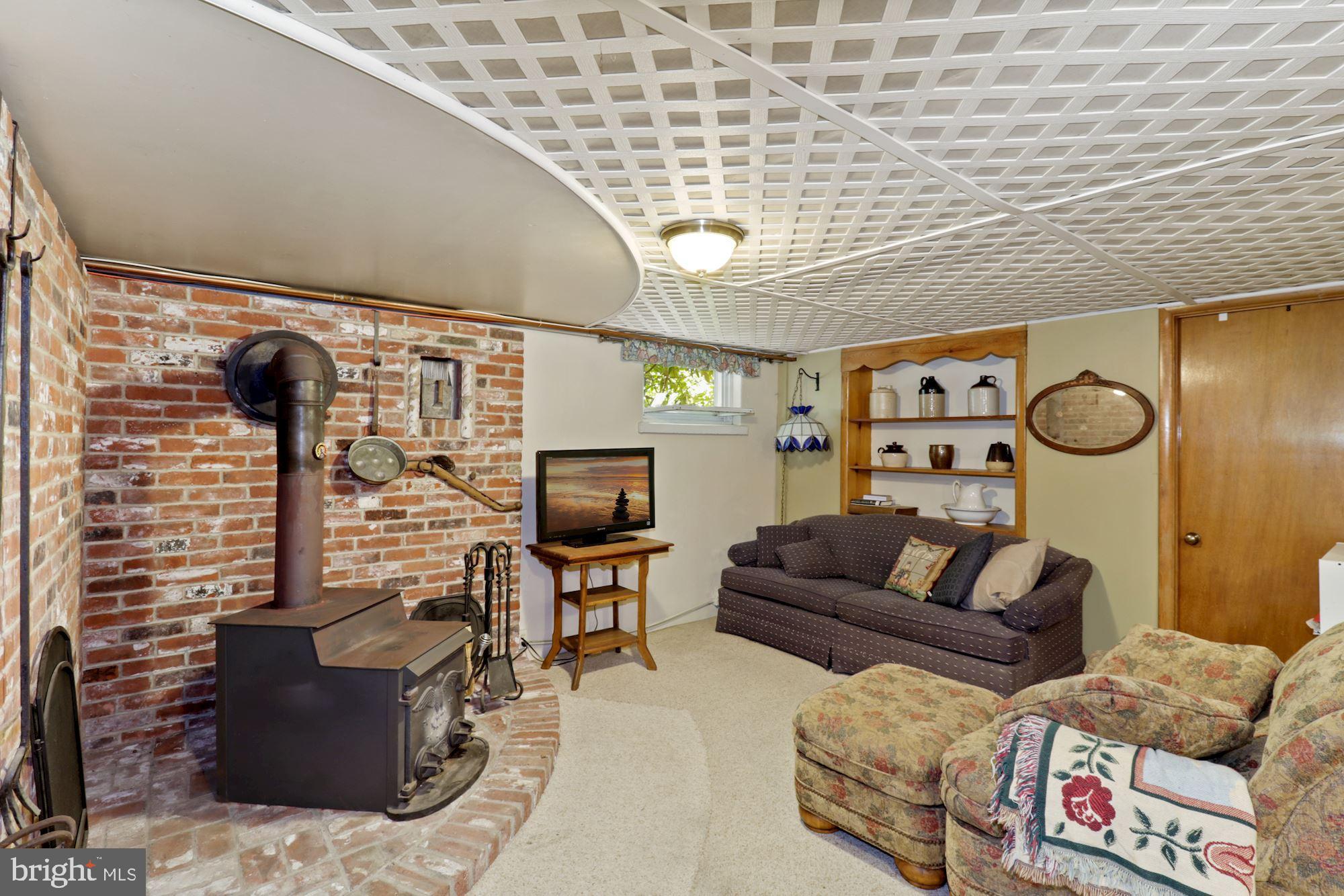 1415 Daws Road Blue Bell, PA 19422 - Photo 13 of 23 Finished basement with wood stove