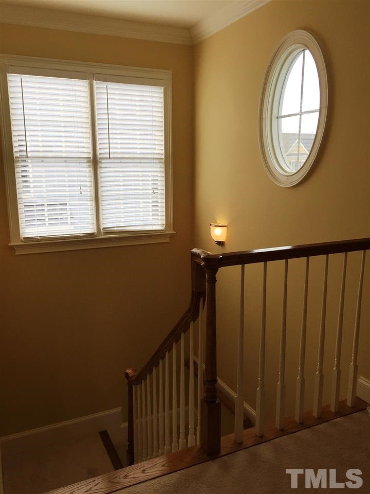 1307 Ileagnes Road Raleigh, NC 27603 - Photo 14 of 24 Bright two-story staircase leading to second floor. Stairs