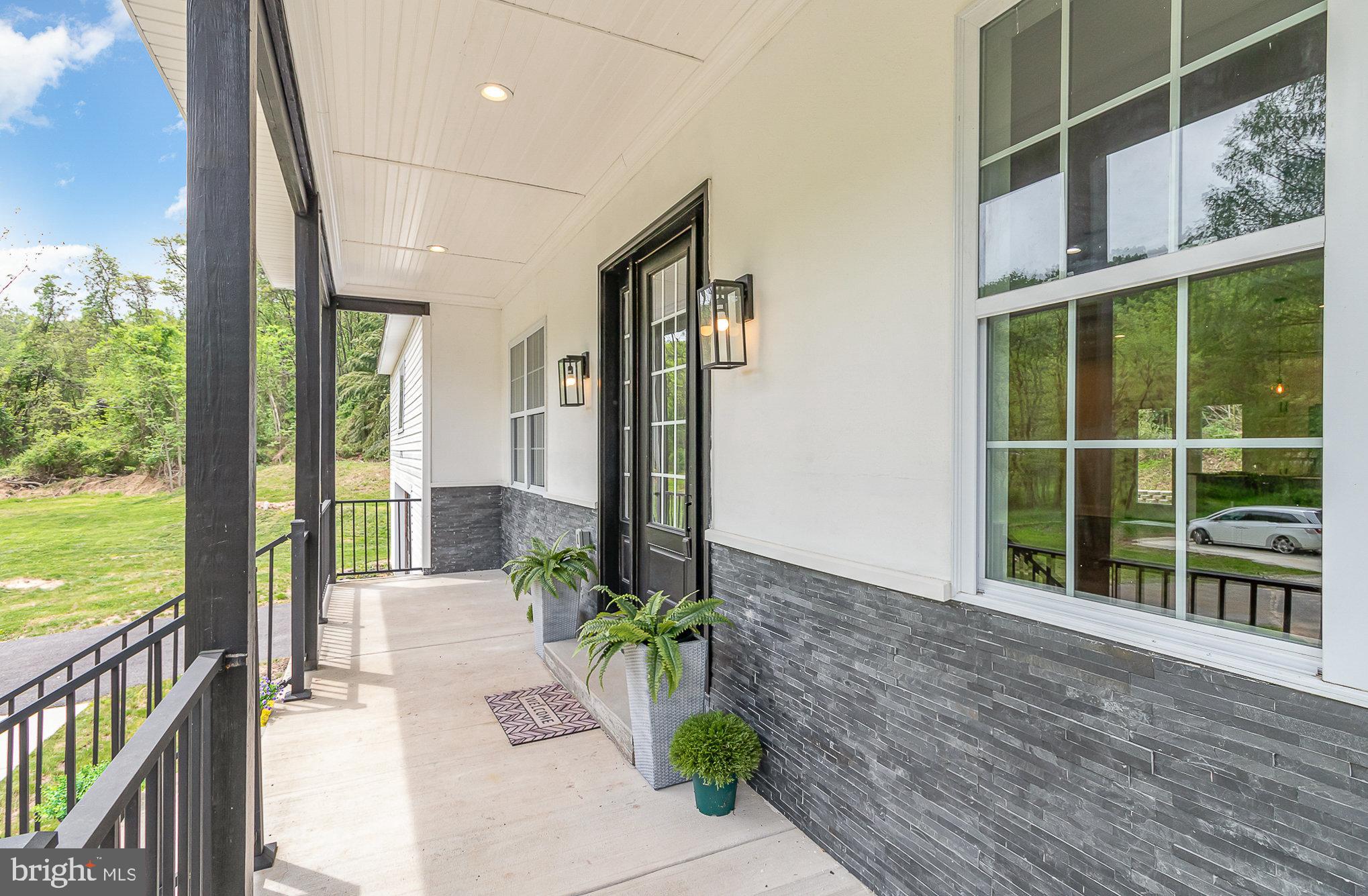 390 Clark Road Hummelstown, PA 17036 - Photo 3 of 43 Enjoy morning's or evening's on a wonderful porch!