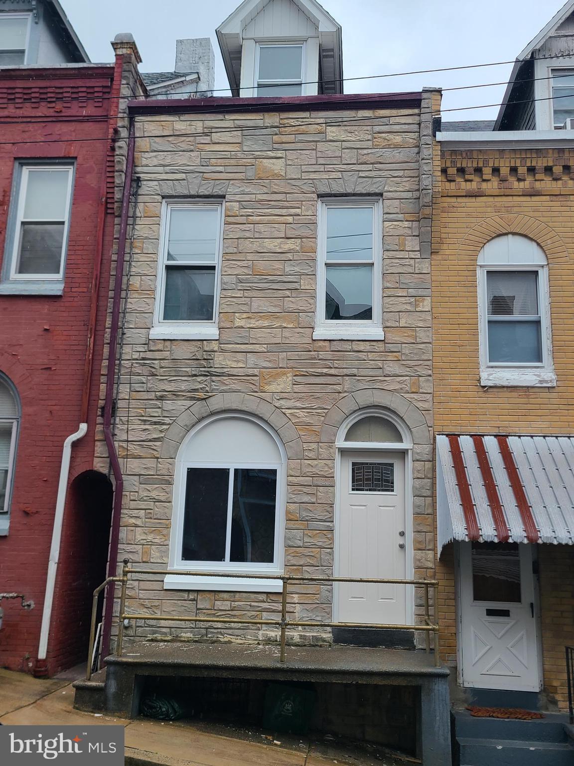 a front view of a house with a door