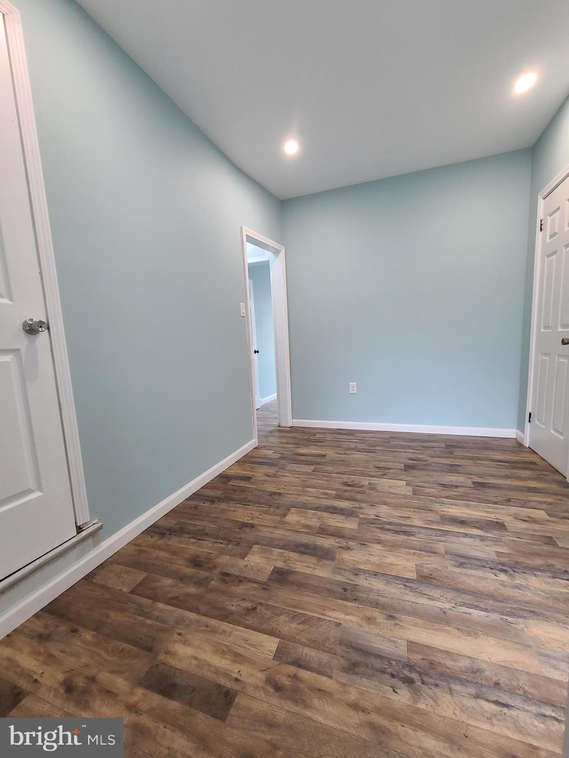 1218 Fidelity Street Reading, PA 19604 - Photo 12 of 14 an empty room with wooden floor