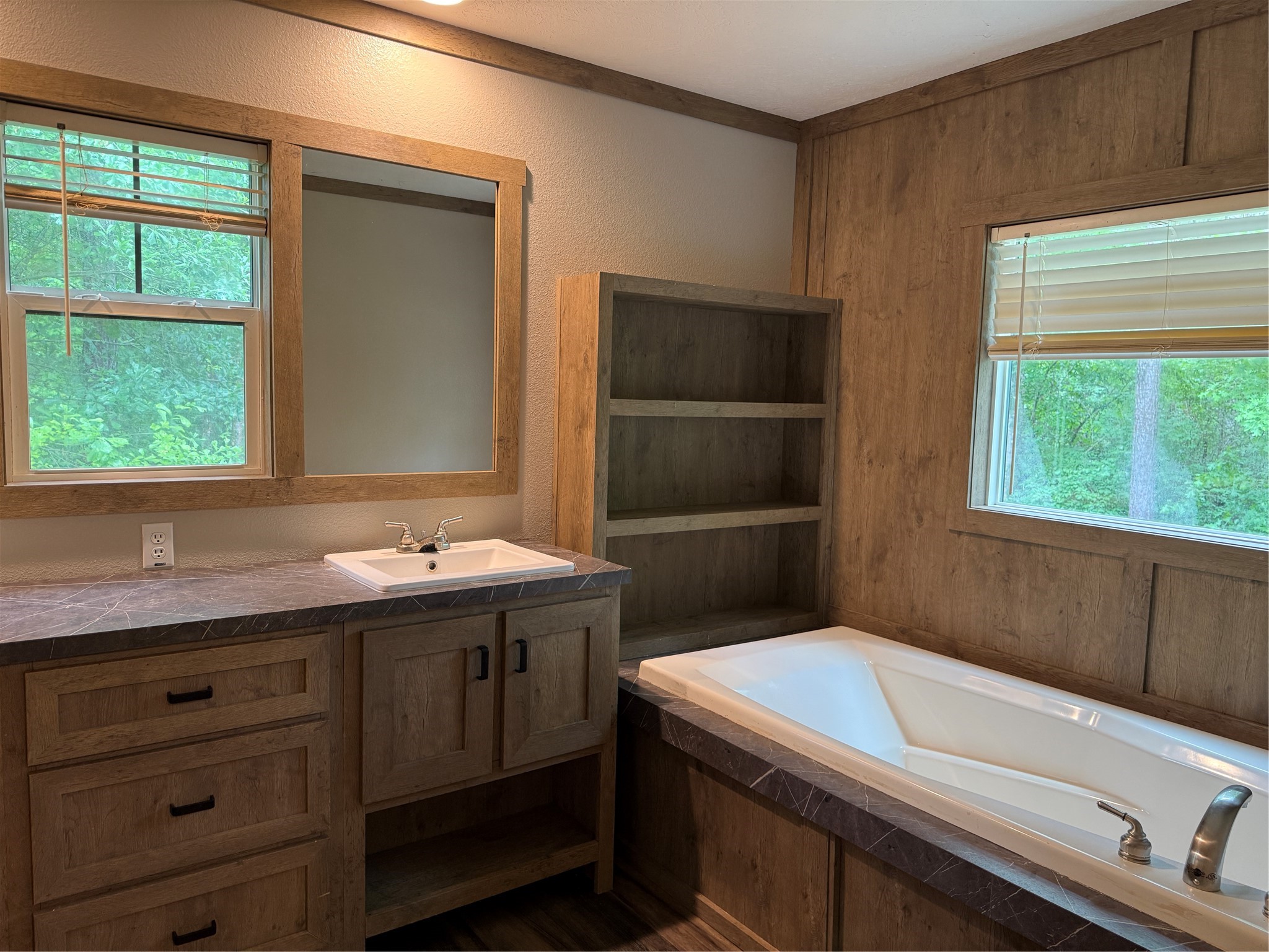 105 Saddle Surrey Road Coldspring, TX 77331 - Photo 41 of 48 a bathroom with a sink and a window