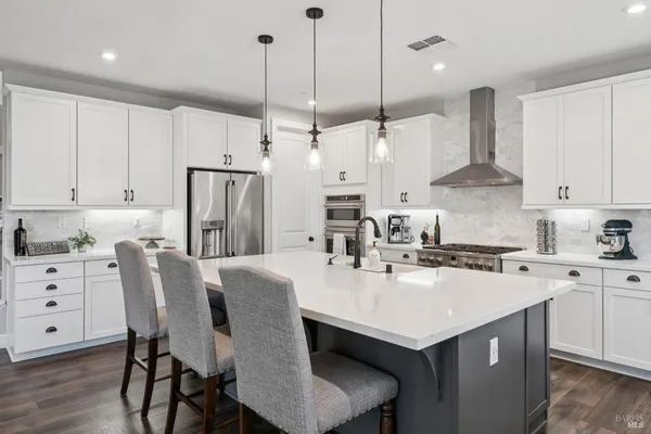 a bathroom with a double vanity sink mirror and with