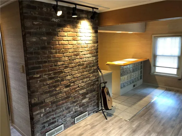 a bathroom with a sink and a shower