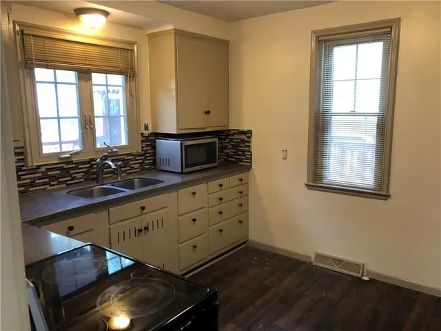 an empty room with windows