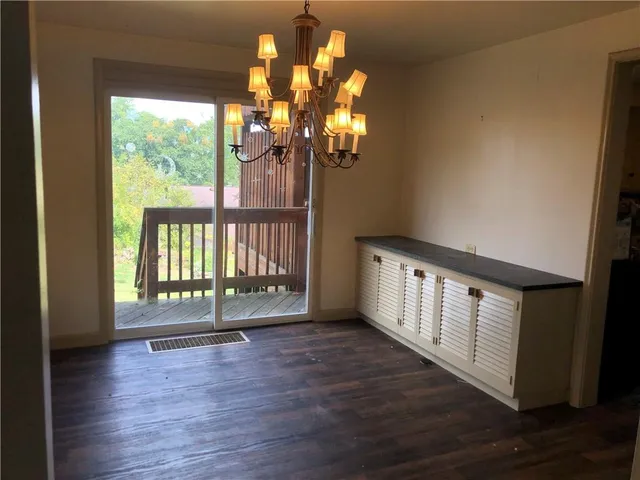 a view of stair with wooden floor
