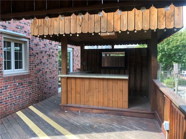 a view of a balcony with an outdoor space