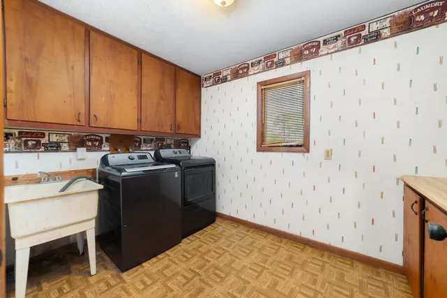 a view of a utility room with washer and dryer