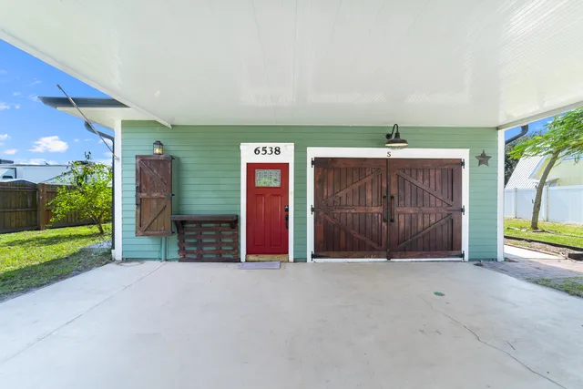 a view of a house with a garage