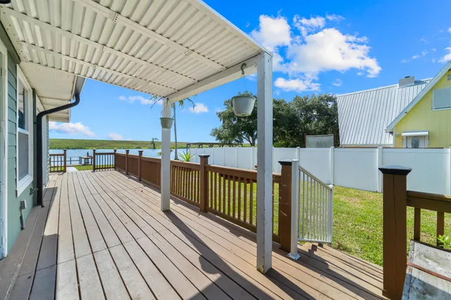 a view of balcony with couch and wooden floor