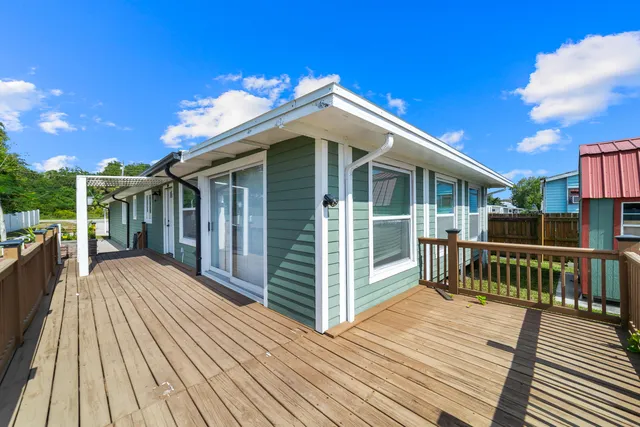 a view of a house with a deck