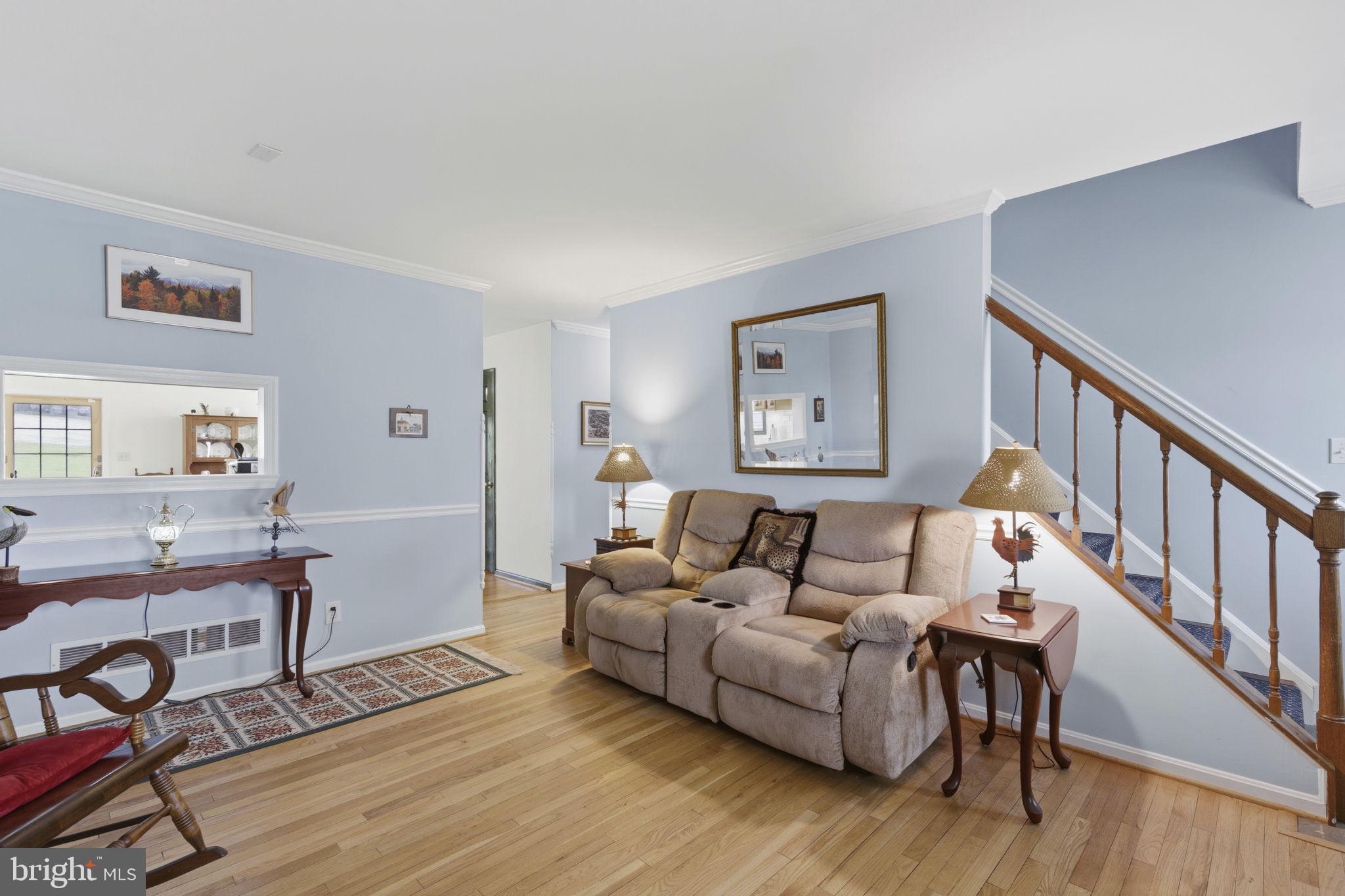 3831 Wilkinson Road Havre de Grace, MD 21078 - Photo 5 of 51 a living room with furniture and a wooden floor