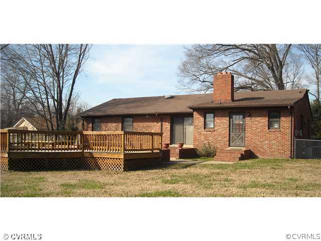 9531 Chester Road North Chesterfield, VA 23237 - Photo 2 of 12 a front view of a house with a yard