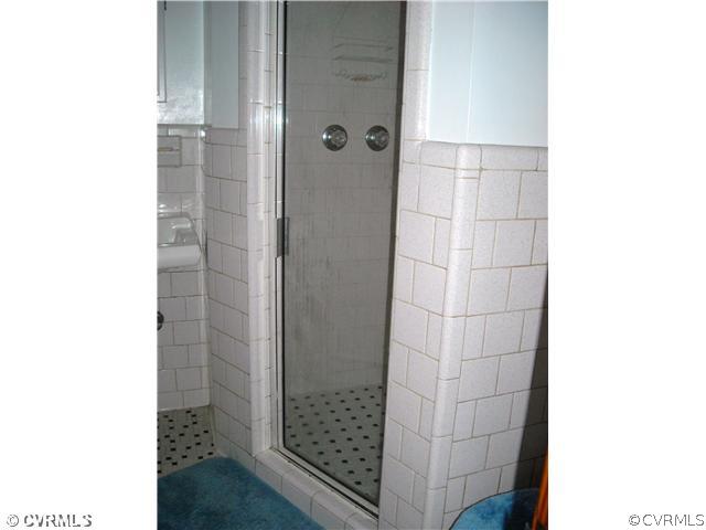 9531 Chester Road North Chesterfield, VA 23237 - Photo 9 of 12 a bathroom with a shower and a sink