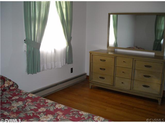 9531 Chester Road North Chesterfield, VA 23237 - Photo 10 of 12 a view of a bedroom with window