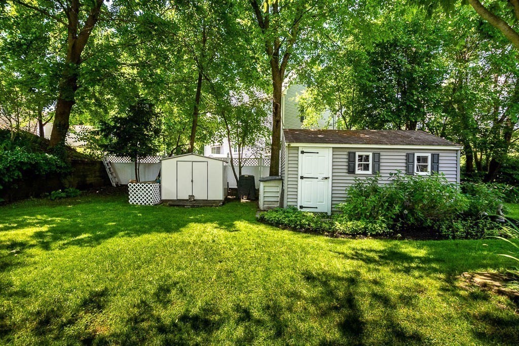 61 Crane Street Dedham, MA 02026 - Photo 28 of 42 a view of backyard with green space