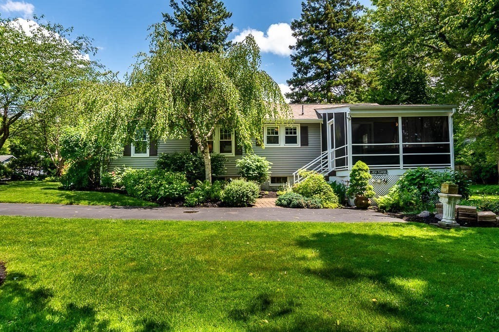 61 Crane Street Dedham, MA 02026 - Photo 29 of 42 a view of a house with a garden