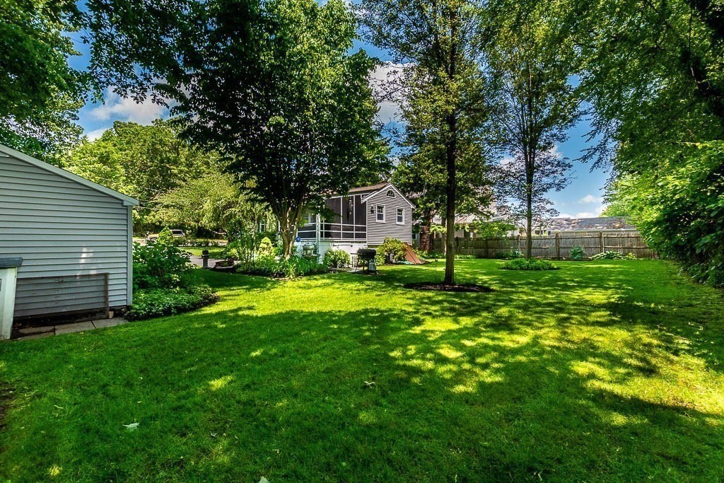 61 Crane Street Dedham, MA 02026 - Photo 37 of 42 a view of house with backyard