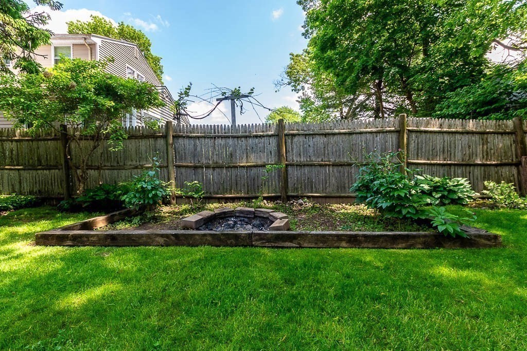 61 Crane Street Dedham, MA 02026 - Photo 39 of 42 a view of a backyard