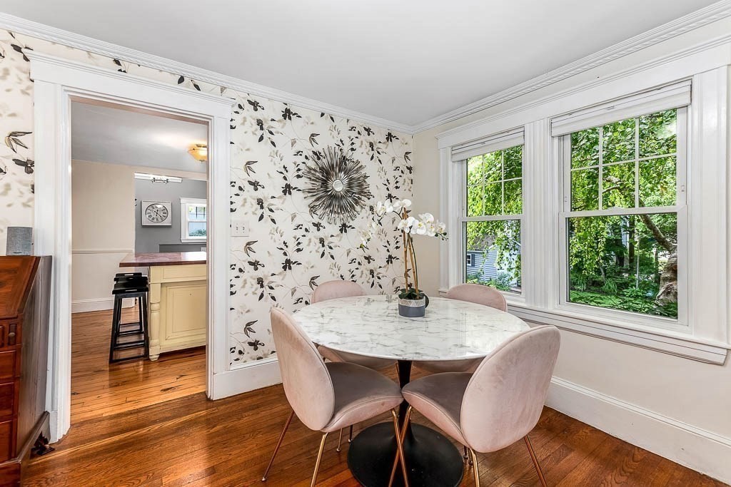 61 Crane Street Dedham, MA 02026 - Photo 10 of 42 a view of a dining room with furniture window and wooden floor